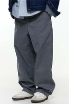 ウォッシュ加工ゆったり微テーパードパンツPS1